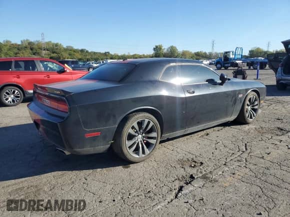 2013 Dodge Challenger SRT-8 with VIN 2C3CDYCJ9DH668163, listed as a Copart auction lot 86838185 with 94,723 mi miles and Clean title. Bid and sale history available at DreamBid. Image 3.