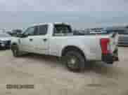 2018 Ford F-250 XL with VIN 1FT7W2A63JEB31682, listed as a Copart auction lot 88759375 with 124,965 mi miles and Salvage title. Bid and sale history available at DreamBid. Image 2.