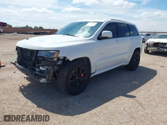 2015 Jeep Grand Cherokee SRT z VIN 1C4RJFDJ4FC182206, wystawiony jako IAAI lot #42431139 z przebiegiem 99 498 mil mil oraz . Historia ofert i sprzedaży dostępna na DreamBid. Obrazek 18.