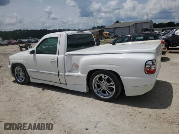 2000 GMC Sierra 1500 SL with VIN 1GTEC14V5YZ231749, listed as a Copart auction lot 65427385 with 98,959 mi miles and Salvage title. Bid and sale history available at DreamBid. Image 2.