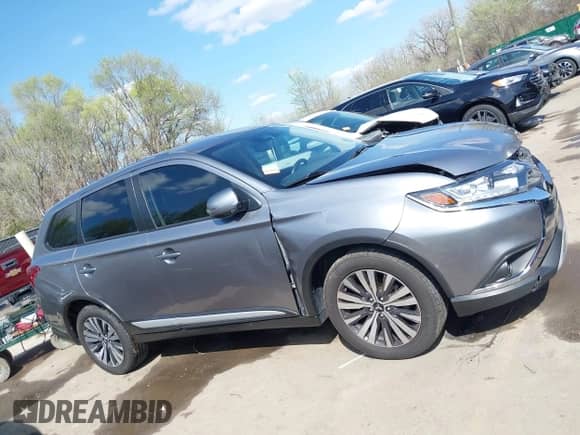 2020 Mitsubishi Outlander SE z VIN JA4AD3A3XLZ024187, wystawiony jako IAAI lot #41915579 z przebiegiem 119 722 mil mil oraz . Historia ofert i sprzedaży dostępna na DreamBid. Obrazek 13.