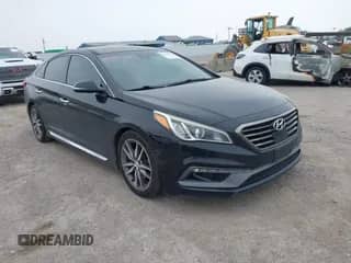 2015 Hyundai Sonata Sport z VIN 5NPE34ABXFH041705, wystawiony jako IAAI lot #42290942 z przebiegiem 126 645 mil mil oraz . Historia ofert i sprzedaży dostępna na DreamBid. Obrazek 1.