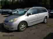 2005 Toyota Sienna XLE z VIN 5TDBA22CX5S051132, wystawiony jako Copart lot #84712135 z przebiegiem 179 807 mil mil oraz Szkoda całkowita • Salvage title. Historia ofert i sprzedaży dostępna na DreamBid. Obrazek 1.