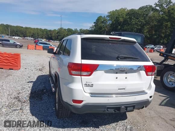 2013 Jeep Grand Cherokee Limited z VIN 1C4RJFBG8DC556272, wystawiony jako IAAI lot #43352592 z przebiegiem 118 793 mil mil oraz . Historia ofert i sprzedaży dostępna na DreamBid. Obrazek 3.