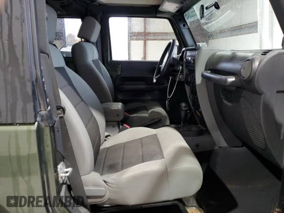 2009 Jeep Wrangler X с VIN 1J4FA24169L708281, выставлен на аукционе Copart как лот 85533845 с пробегом 83 553 миль миль и Списание • Salvage title. История ставок и продаж доступна на DreamBid. Изображение 10.
