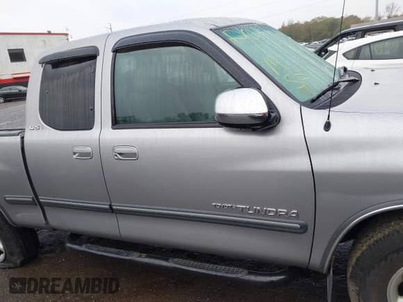 2002 Toyota Tundra SR5 z VIN 5TBRT34122S270133, wystawiony jako IAAI lot #43419031 z przebiegiem 104 846 mil mil oraz . Historia ofert i sprzedaży dostępna na DreamBid. Obrazek 13.
