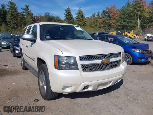 2012 Chevrolet Tahoe LTZ with VIN 1GNSKCE04CR116578, listed as a IAAI auction lot 43337709 with 251,212 mi miles and . Bid and sale history available at DreamBid. Image 6.