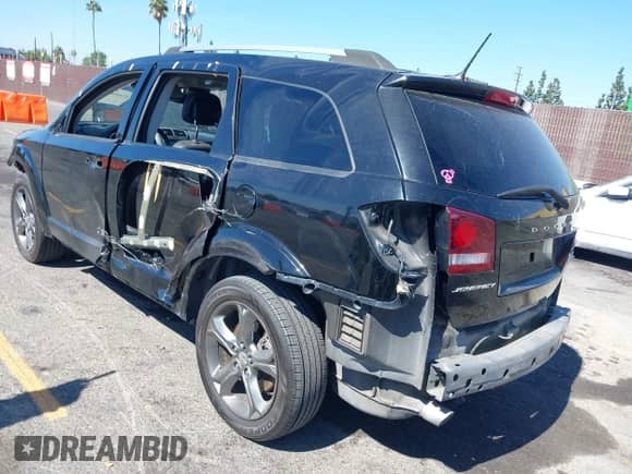2016 Dodge Journey Crossroad Plus with VIN 3C4PDCGG6GT220148, listed as a IAAI auction lot 43369268 with 99,000 mi miles and . Bid and sale history available at DreamBid. Image 3.