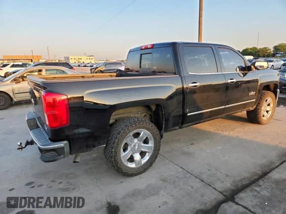 2018 Chevrolet Silverado 1500 LTZ with VIN 3GCPCSECXJG225835, listed as a Copart auction lot 69875915 with 116,661 mi miles and Clean title. Bid and sale history available at DreamBid. Image 3.