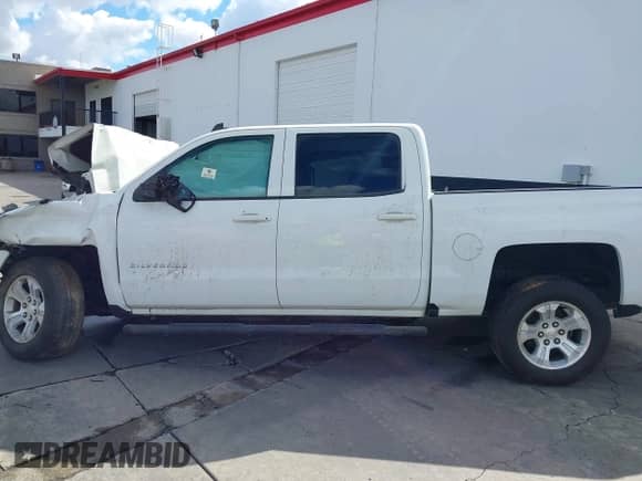 2016 Chevrolet Silverado 1500 LT z VIN 3GCUKREC5GG191603, wystawiony jako IAAI lot #34016468 z przebiegiem Nie podano mil oraz . Historia ofert i sprzedaży dostępna na DreamBid. Obrazek 14.