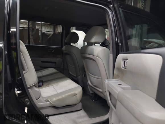 2015 Honda Pilot LX with VIN 5FNYF4H2XFB019714, listed as a IAAI auction lot 43243273 with 124,959 mi miles and . Bid and sale history available at DreamBid. Image 8.