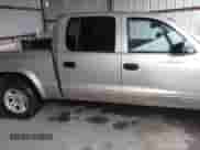2003 Dodge Dakota SLT z VIN 1D7HL48N93S303911, wystawiony jako IAAI lot #41536555 z przebiegiem 383 306 mil mil oraz . Historia ofert i sprzedaży dostępna na DreamBid. Obrazek 20.