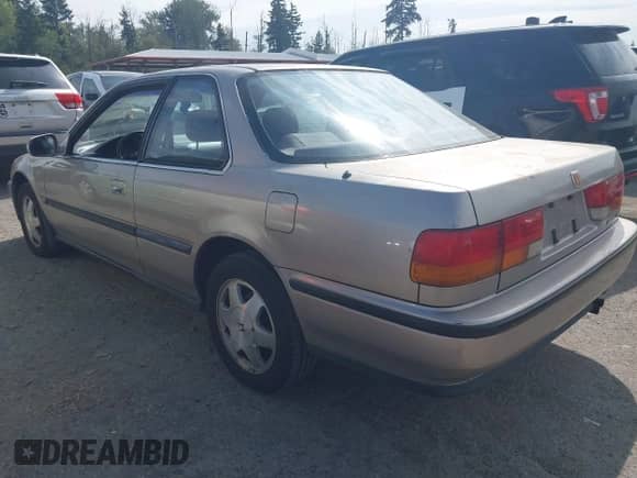 1993 Honda Accord with VIN 1HGCB7274PA010997, listed as a IAAI auction lot 43185754 with 174,206 mi miles and . Bid and sale history available at DreamBid. Image 3.