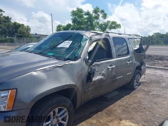 2007 Chevrolet Suburban LS with VIN 1GNFC16J77R260500, listed as a IAAI auction lot 42787990 with 167,163 mi miles and . Bid and sale history available at DreamBid. Image 6.