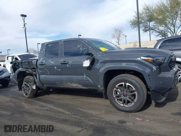 2024 Toyota Tacoma SR5 with VIN 3TMLB5JN5RM051339, listed as a IAAI auction lot 41241754 with 7,181 mi miles and . Bid and sale history available at DreamBid. Image 6.