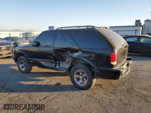 2000 Chevrolet Blazer LS с VIN 1GNCS18W9YK197621, выставлен на аукционе Copart как лот 81809994 с пробегом 339 155 миль миль и Списание • Salvage title. История ставок и продаж доступна на DreamBid. Изображение 2.