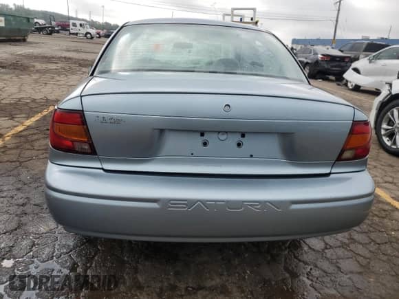2002 Saturn SL with VIN 1G8ZH52832Z195679, listed as a Copart auction lot 70691184 with 63,707 mi miles and Clean title. Bid and sale history available at DreamBid. Image 6.
