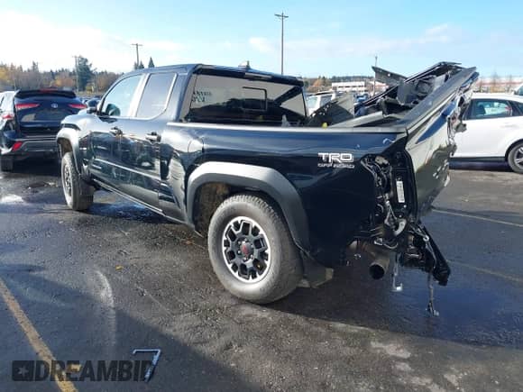 2024 Toyota Tacoma SR5 with VIN 3TMLB5JNXRM049327, listed as a IAAI auction lot 40906568 with 691 mi miles and . Bid and sale history available at DreamBid. Image 3.