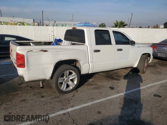 2011 Dodge Dakota с VIN 1D7RE3GP0BS602729, выставлен на аукционе Copart как лот 82971154 с пробегом 178 751 миль миль и Списание • Salvage title. История ставок и продаж доступна на DreamBid. Изображение 3.