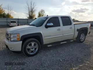 2013 Chevrolet Silverado 1500 LTZ with VIN 3GCPKTE71DG310966, listed as a Copart auction lot 82216535 with 153,969 mi miles and Clean title. Bid and sale history available at DreamBid. Image 1.