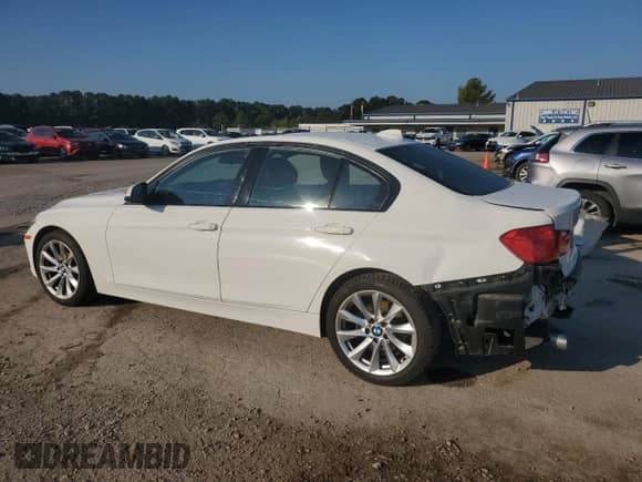 2015 BMW 3 Series 320i xDrive with VIN WBA3C3G58FNT53067, listed as a Copart auction lot 71211105 with 101,591 mi miles and Salvage title. Bid and sale history available at DreamBid. Image 2.