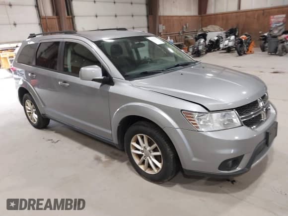 2017 Dodge Journey SXT with VIN 3C4PDDBG7HT515001, listed as a IAAI auction lot 43532217 with 124,332 mi miles and . Bid and sale history available at DreamBid. Image 1.