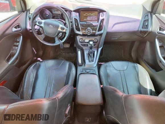 2012 Ford Focus Titanium z VIN 1FAHP3N22CL297534, wystawiony jako Copart lot #63643125 z przebiegiem 180 383 mil mil oraz Czysty tytuł • Clean title. Historia ofert i sprzedaży dostępna na DreamBid. Obrazek 8.