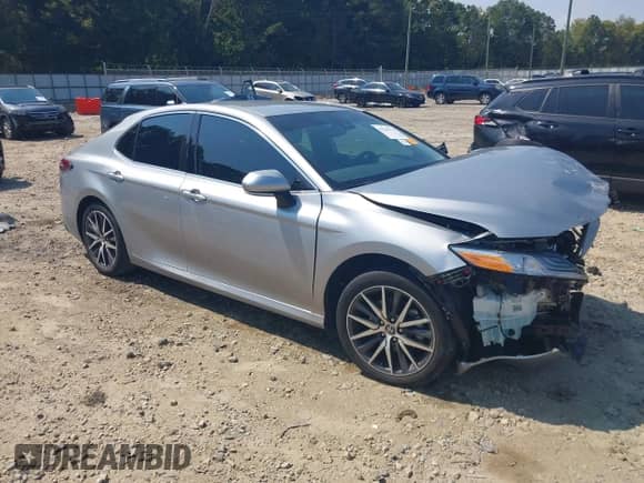 2023 Toyota Camry Hybrid XLE with VIN 4T1F31AK2PU612612, listed as a IAAI auction lot 43246178 with 25,221 mi miles and . Bid and sale history available at DreamBid. Image 1.