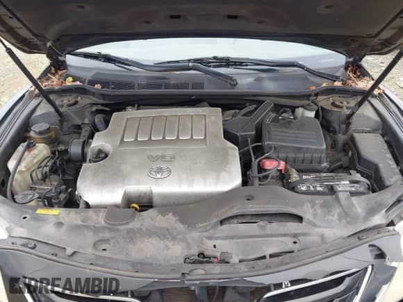 2007 Toyota Camry LE z VIN 4T1BK46K17U520161, wystawiony jako IAAI lot #43452382 z przebiegiem 167 917 mil mil oraz . Historia ofert i sprzedaży dostępna na DreamBid. Obrazek 10.