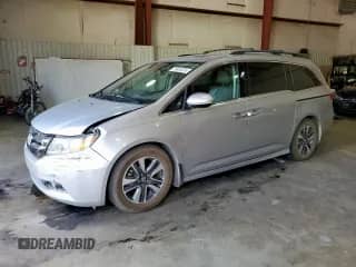 2015 Honda Odyssey Touring Elite с VIN 5FNRL5H98FB035250, выставлен на аукционе Copart как лот 85934915 с пробегом 182 965 миль миль и Списание • Salvage title. История ставок и продаж доступна на DreamBid. Изображение 1.