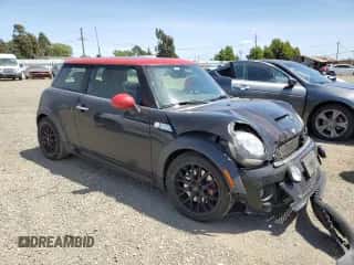 2013 MINI Hardtop John Cooper Works with VIN WMWSU9C58DT722617, listed as a Copart auction lot 57356095 with 202,230 mi miles and Salvage title. Bid and sale history available at DreamBid. Image 4.