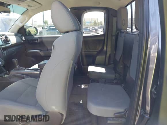 2018 Toyota Tacoma SR with VIN 5TFRX5GN1JX118441, listed as a IAAI auction lot 41870266 with 95,612 mi miles and . Bid and sale history available at DreamBid. Image 8.