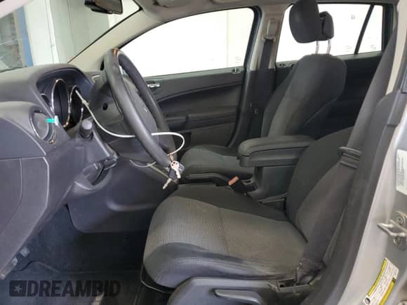 2011 Dodge Caliber Mainstreet with VIN 1B3CB3HA9BD257175, listed as a Copart auction lot 81988805 with 67,817 mi miles and Salvage title. Bid and sale history available at DreamBid. Image 7.