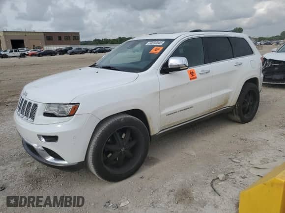 2014 Jeep Grand Cherokee Summit with VIN 1C4RJFJT3EC279918, listed as a Copart auction lot 60592045 with 108,598 mi miles and Salvage title. Bid and sale history available at DreamBid. Image 1.