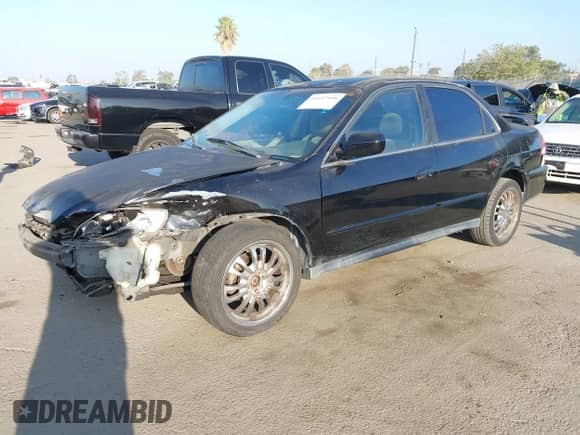 2001 Honda Accord LX with VIN 1HGCG56411A119012, listed as a IAAI auction lot 43357918 with 158,344 mi miles and . Bid and sale history available at DreamBid. Image 2.