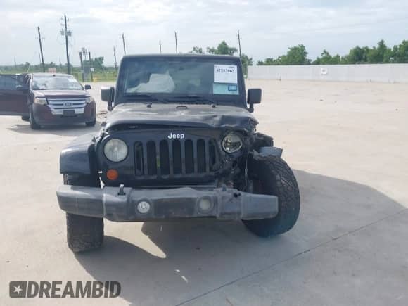 2008 Jeep Wrangler Unlimited Sahara с VIN 1J4GA59138L573998, выставлен на аукционе IAAI как лот 42582065 с пробегом 156 855 миль миль и . История ставок и продаж доступна на DreamBid. Изображение 12.