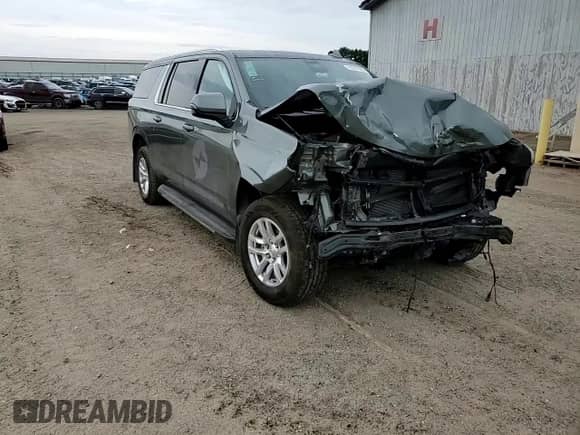 2023 Chevrolet Suburban LT with VIN 1GNSKCKD2PR164058, listed as a Copart auction lot 70387065 with 58,551 mi miles and Salvage title. Bid and sale history available at DreamBid. Image 15.