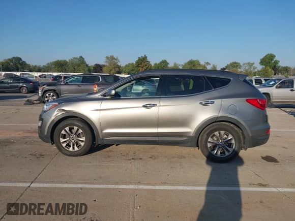 2016 Hyundai Santa Fe with VIN 5XYZU3LB3GG335302, listed as a IAAI auction lot 43344298 with 96,878 mi miles and . Bid and sale history available at DreamBid. Image 14.