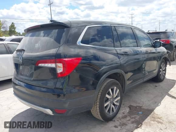 2020 Honda Pilot EX-L with VIN 5FNYF5H51LB002957, listed as a IAAI auction lot 43273685 with 72,681 mi miles and . Bid and sale history available at DreamBid. Image 4.