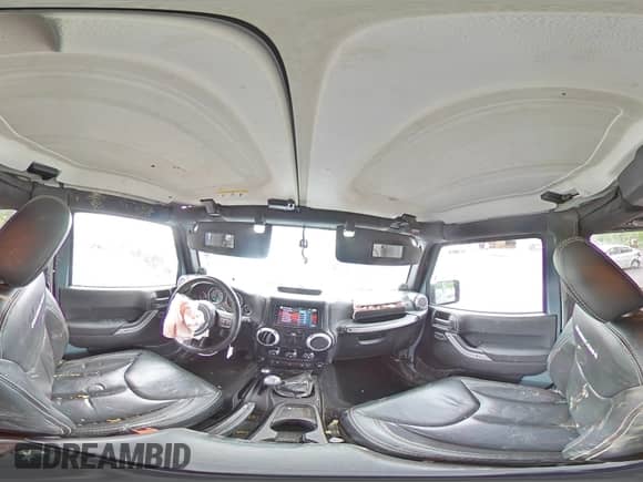 2014 Jeep Wrangler Rubicon with VIN 1C4BJWCG9EL144749, listed as a Copart auction lot 57022735 with 160,529 mi miles and Salvage title. Bid and sale history available at DreamBid. Image 16.