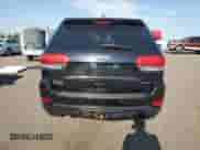 2016 Jeep Grand Cherokee Laredo with VIN 1C4RJFAG2GC379787, listed as a Copart auction lot 84704385 with 112,063 mi miles and Salvage title. Bid and sale history available at DreamBid. Image 6.