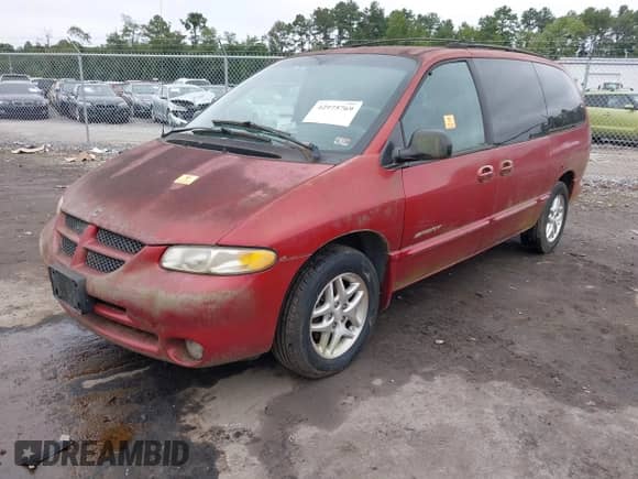 2000 Dodge Caravan SE with VIN 1B4GP44G0YB801534, listed as a IAAI auction lot 42975769 with Not provided miles and . Bid and sale history available at DreamBid. Image 2.