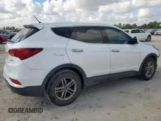 2018 Hyundai Santa Fe 2.4L z VIN 5XYZT3LB8JG560258, wystawiony jako Copart lot #81731355 z przebiegiem 98 270 mil mil oraz Szkoda całkowita • Salvage title. Historia ofert i sprzedaży dostępna na DreamBid. Obrazek 3.