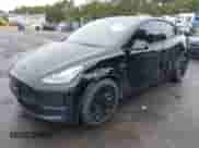 2022 Tesla Model Y Long Range z VIN 7SAYGDEE0NF385324, wystawiony jako IAAI lot #43128196 z przebiegiem 64 655 mil mil oraz . Historia ofert i sprzedaży dostępna na DreamBid. Obrazek 20.