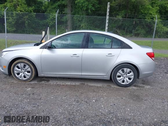 2014 Chevrolet Cruze LS with VIN 1G1PB5SHXE7158197, listed as a IAAI auction lot 42496148 with 248,086 mi miles and . Bid and sale history available at DreamBid. Image 14.