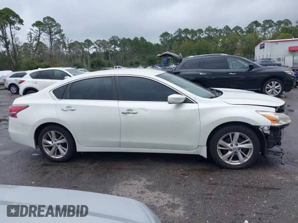 2015 Nissan Altima S z VIN 1N4AL3AP2FC579076, wystawiony jako IAAI lot #43417561 z przebiegiem 162 679 mil mil oraz . Historia ofert i sprzedaży dostępna na DreamBid. Obrazek 13.