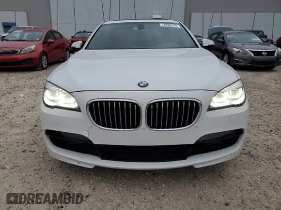 2013 BMW 7 Series 750i with VIN WBAYA8C54DC996569, listed as a Copart auction lot 74199774 with 107,871 mi miles and Salvage title. Bid and sale history available at DreamBid. Image 5.