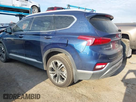 2020 Hyundai Santa Fe SEL with VIN 5NMS3CAA3LH285659, listed as a IAAI auction lot 42839132 with 99,410 mi miles and . Bid and sale history available at DreamBid. Image 3.