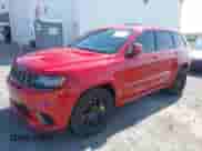 2018 Jeep Grand Cherokee Trackhawk z VIN 1C4RJFN95JC309851, wystawiony jako IAAI lot #42437320 z przebiegiem 56 504 mil mil oraz . Historia ofert i sprzedaży dostępna na DreamBid. Obrazek 6.