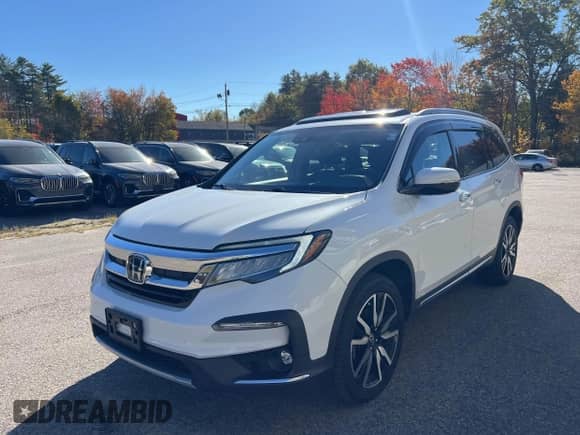 2022 Honda Pilot Elite z VIN 5FNYF6H08NB061842, wystawiony jako IAAI lot #43489129 z przebiegiem 141 490 mil mil oraz . Historia ofert i sprzedaży dostępna na DreamBid. Obrazek 2.